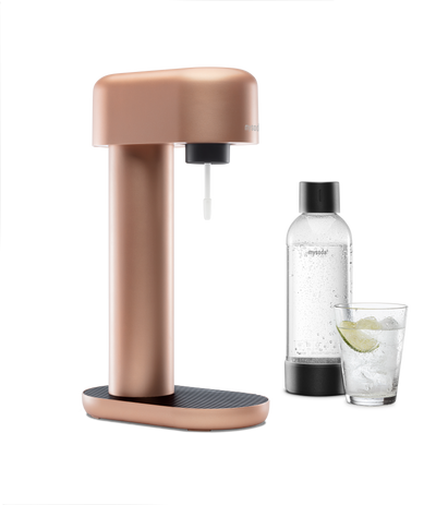 A copper Ruby sparkling water maker with bottle