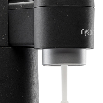 A close-up of a black Mysoda Toby sparkling water maker
